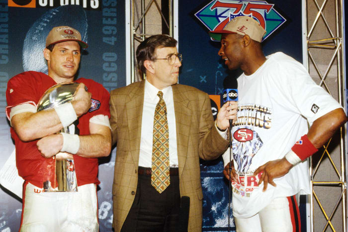 Steve Young and Jerry Rice talk to Brent Musberger after the 49ers’ victory in Super Bowl XXIX.